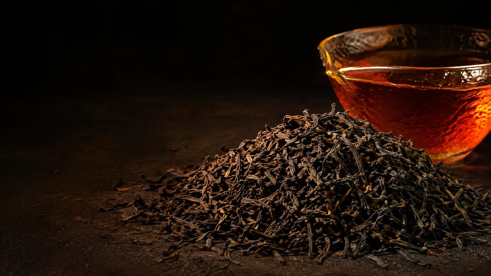 Low-Grown Wiry Black Loose Tea Leaves & Amber Brew