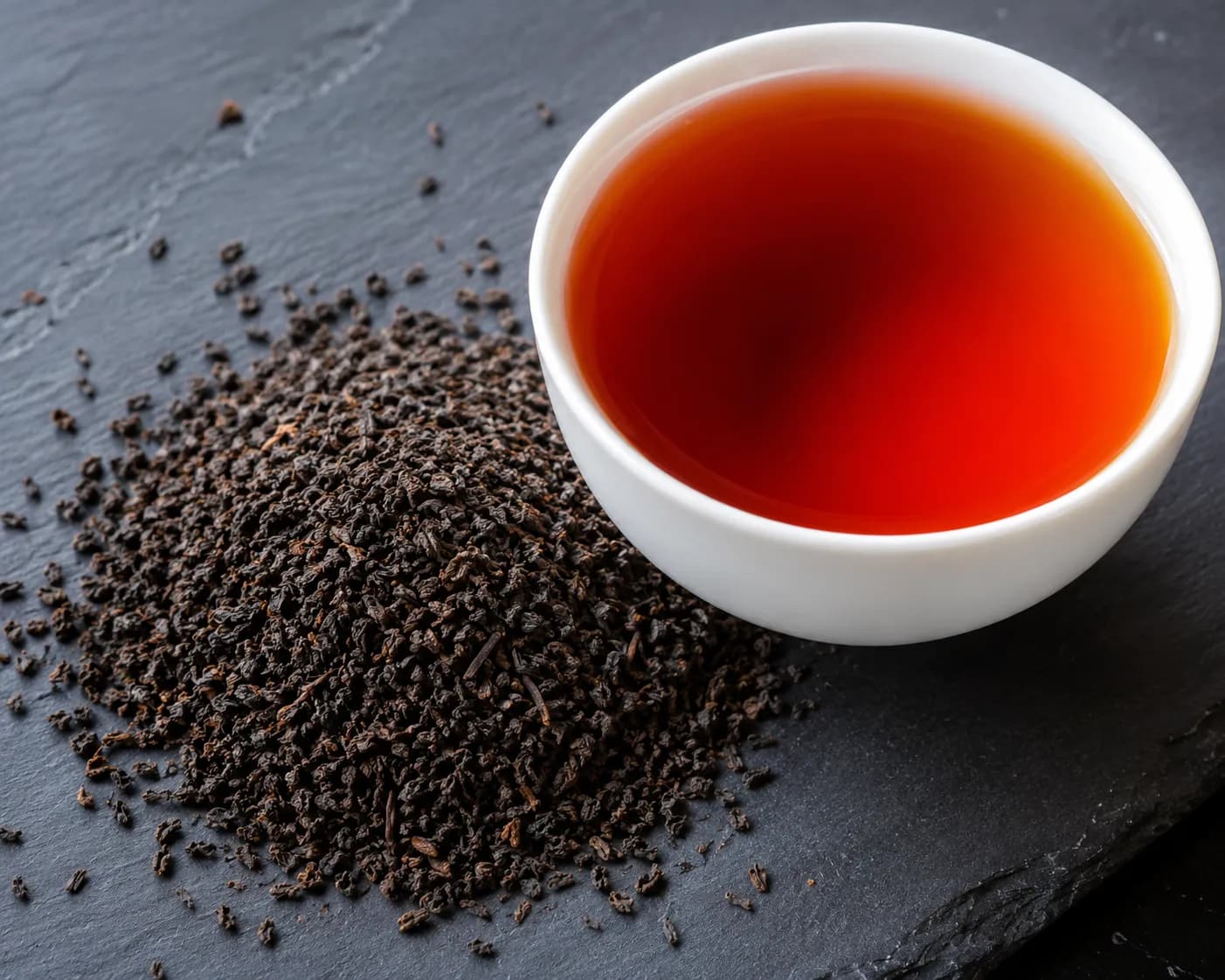 Ceylon BOP (Broken Orange Pekoe) Orthodox Black Tea Grade Pure Ceylon BOP Broken Orange Pekoe black tea leaves and bright coppery infusion