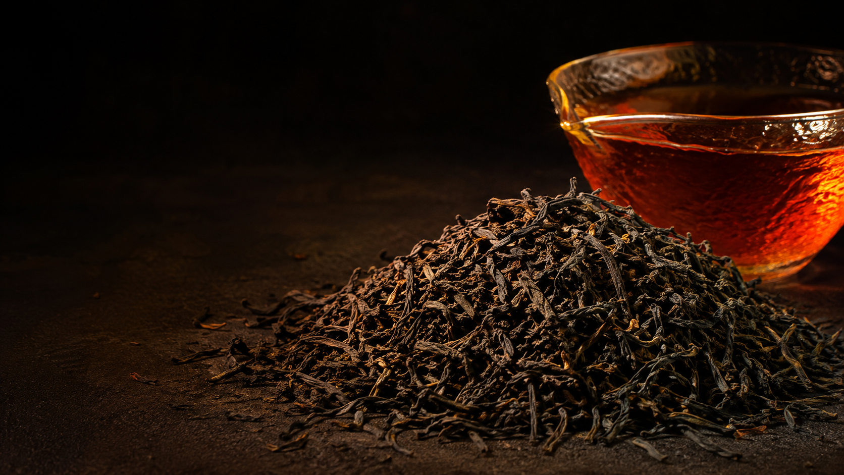 Low-Grown Wiry Black Loose Tea Leaves & Amber Brew