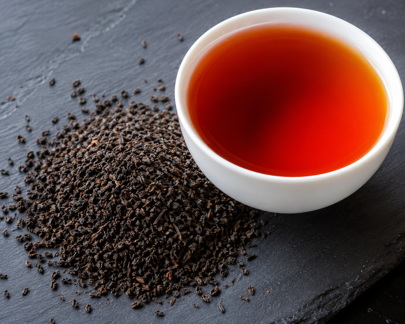 Ceylon BOP (Broken Orange Pekoe) Orthodox Black Tea Grade Pure Ceylon BOP Broken Orange Pekoe black tea leaves and bright coppery infusion