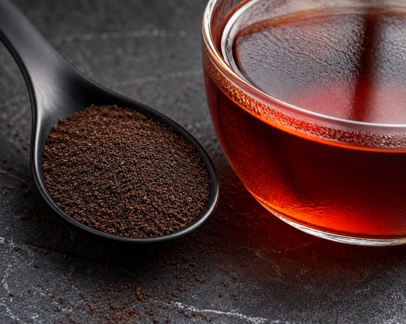 Ceylon BOPF (Broken Orange Pekoe Fannings) Tea Grade Ceylon BOPF Broken Orange Pekoe Fannings tea particles with intense ruby red liquor