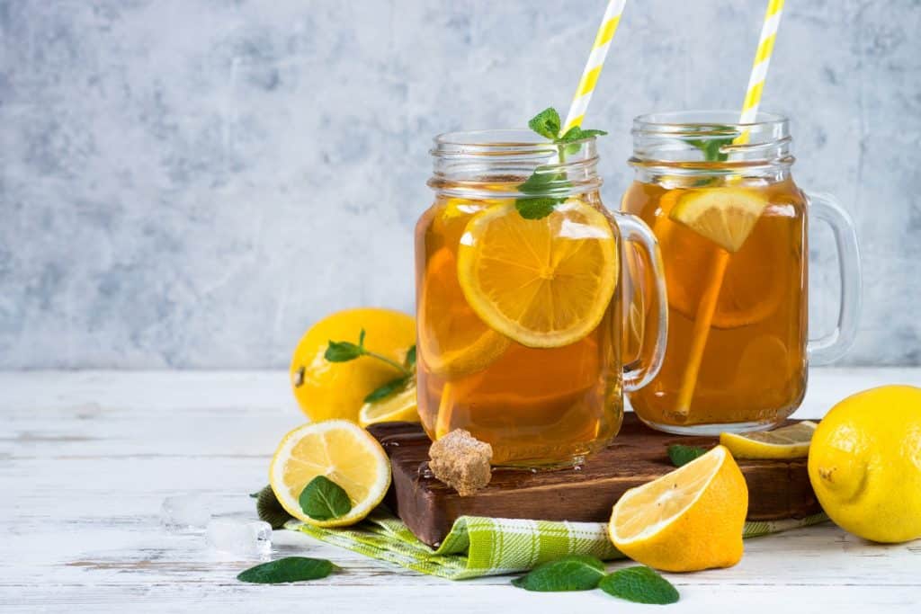 Iced tea with lemon. Refreshment cold summer drink.