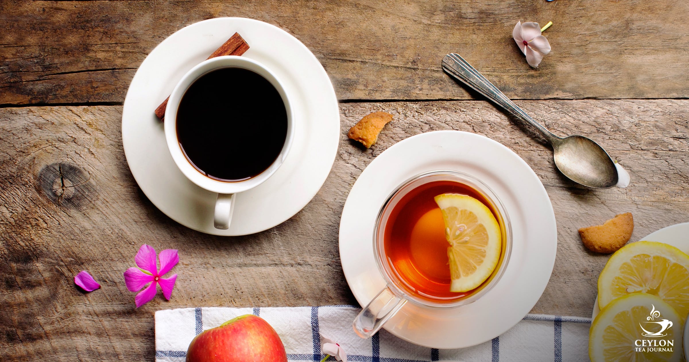 Tea cups and fruits on top a surface
